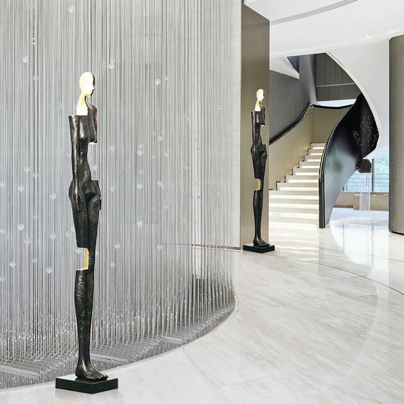 Metal humanoid art sculpture