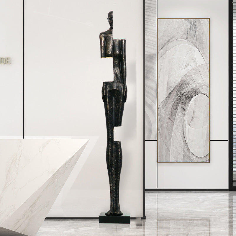Metal humanoid art sculpture