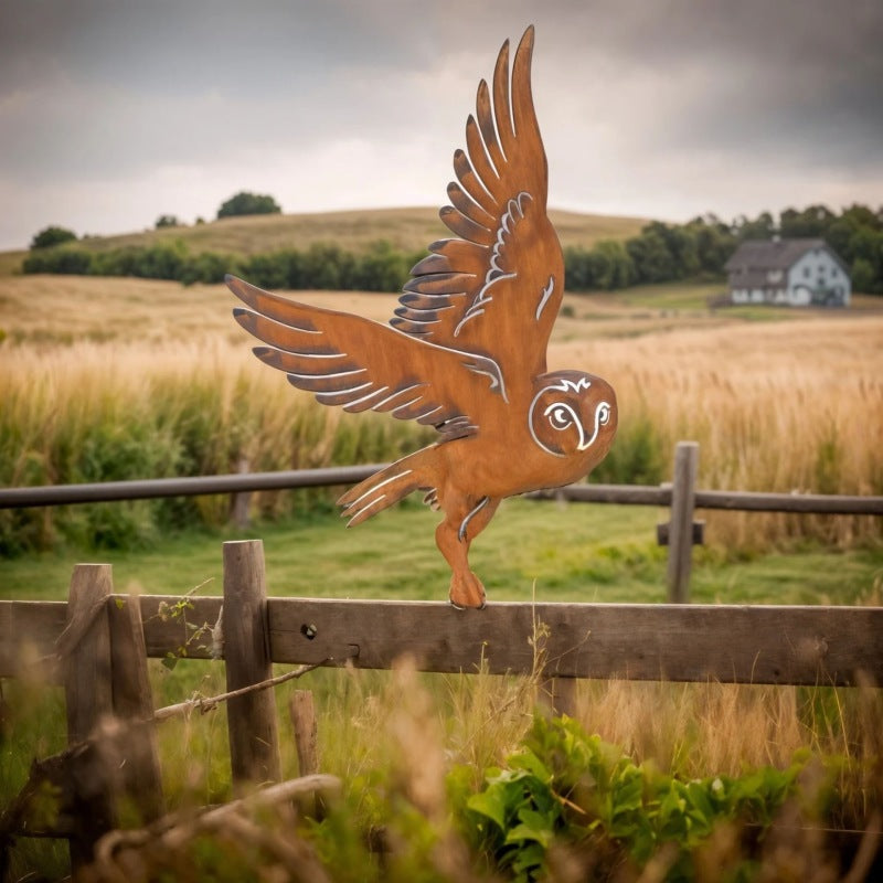 Metal owl sculpture