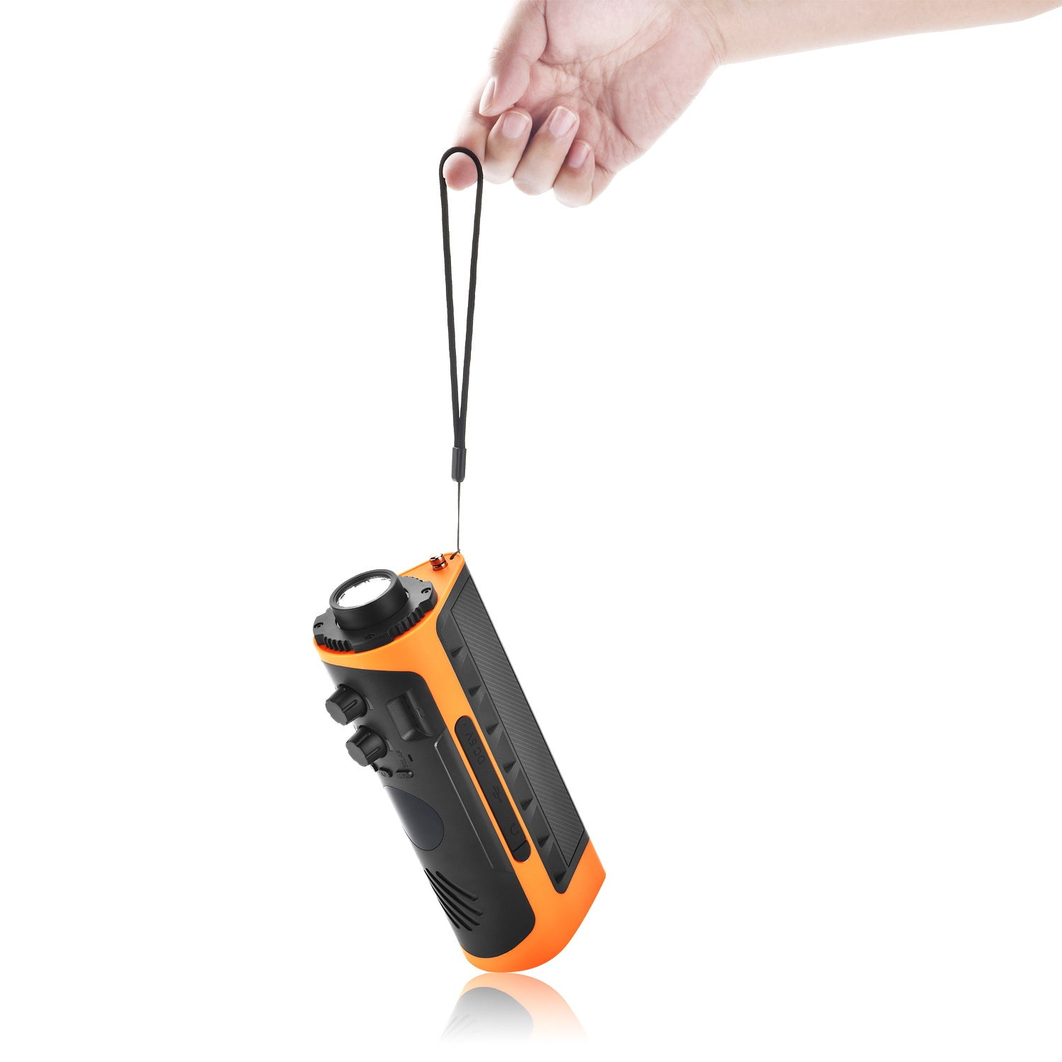Portable radio with flashlight